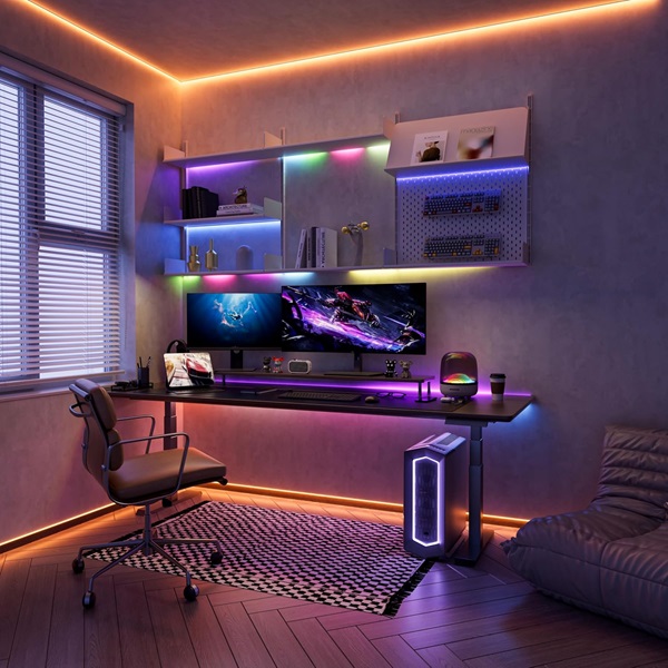 Gaming room with colored lighting around the ceiling, shelves, and desk